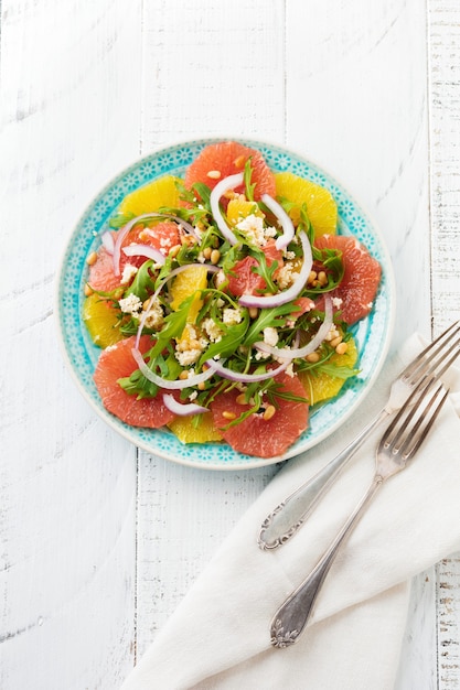 Citrus vitamin salad in a ceramic plate