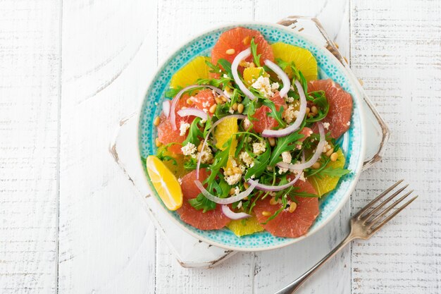 Citrus vitamin salad in a ceramic plate