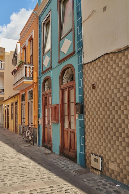 City alley view of residential houses and buildings in a quiet street in Santa Cruz La Palma Spain Historical spanish and colonial architecture in a tropical village and famous tourism destination