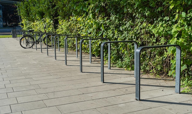 City Bicycle Parking New Bike Station Metal Shiny Modern Bike Storage Security Concept Empty Street Bicycle Parking Cycling Infrastructure