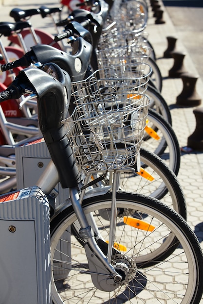 City bicycles parked in row