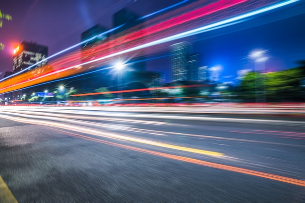 City building background and asphalt road, rail, night