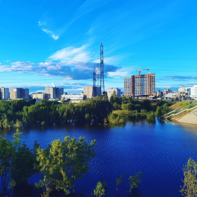 City buildings against blue sky