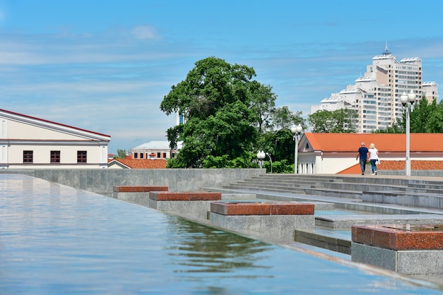 City fountain with water flowing down