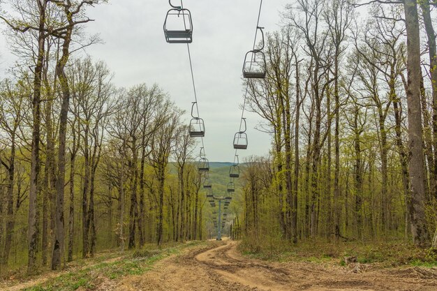 The city of Goryachy Klyuch chairlifts in the forest A cable car for climbing to the top of the mountain without people