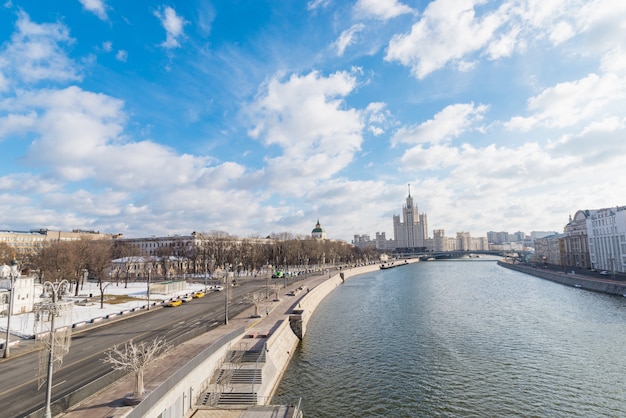City landscape with view on Moscow Kremlin and reflections in waters of Moskva river. 