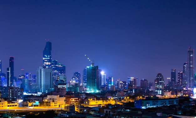 City at night scene of downtown in Bangkok Thailand.