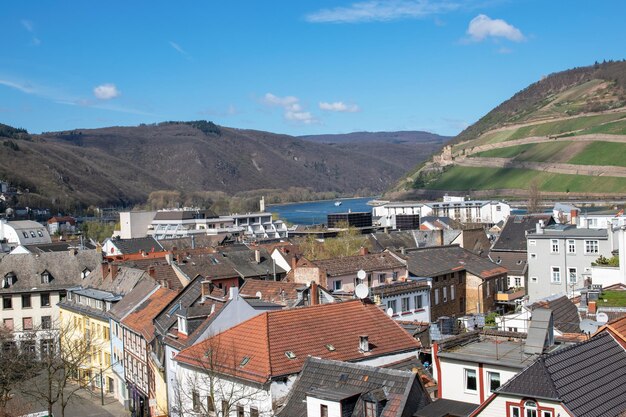 City on the river with much houses grapes mountains