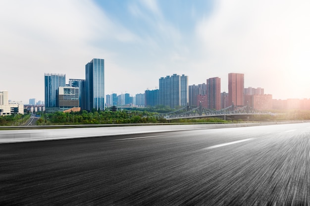 The city and the road in the modern office building background