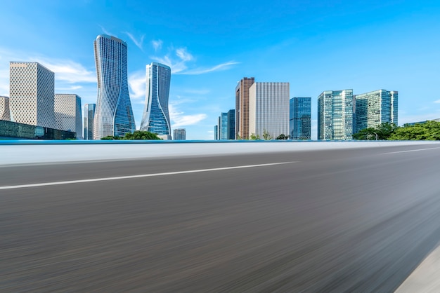 City road through modern buildings in China