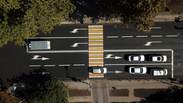 City roads from above - modern urban traffic intersection in august