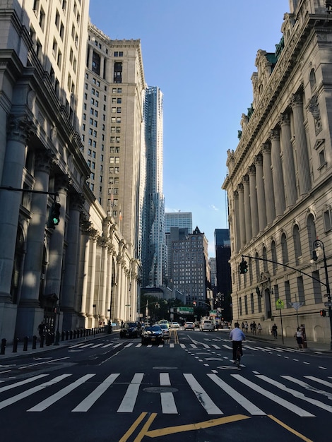 City street amidst buildings in city