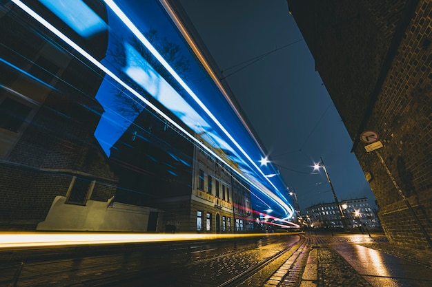 City street at night with vehicle light trails