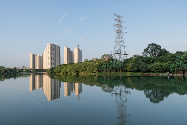 A city surrounded by forests and rivers