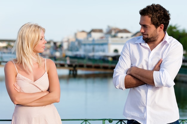 City tourism - couple in vacation having discussion