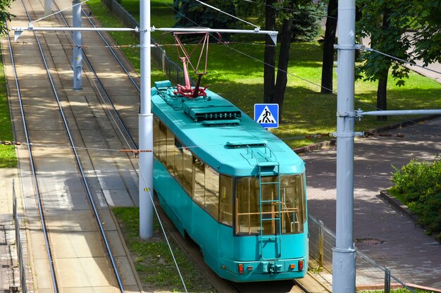 City tram rides along the tracks.