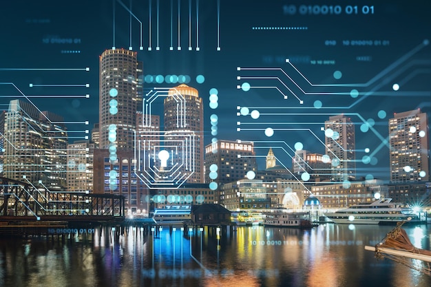 Foto panorama di vista sulla città del porto di boston e del seaport blvd di notte massachusetts edifici esterni del centro finanziario ologramma del lucchetto luminoso concetto di sicurezza informatica per proteggere le informazioni