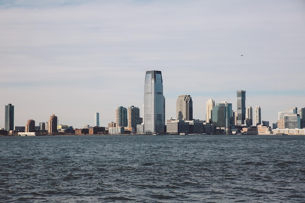 city at waterfront against sky