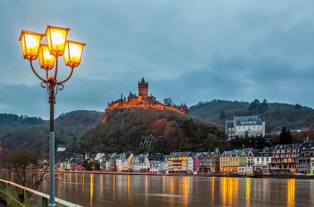 a city with a castle on the top of it