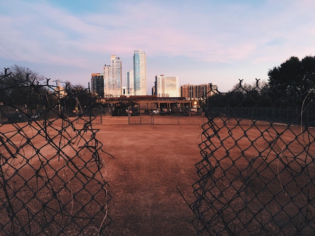 Photo cityscape against sky during sunset