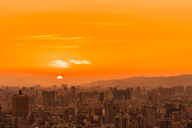 Cityscape against sky during sunset