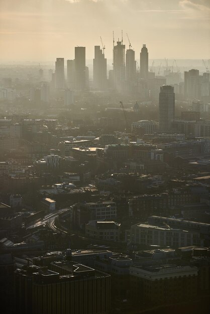 Photo cityscape against sky during sunset