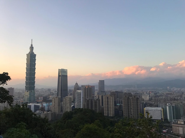 Cityscape against sky during sunset