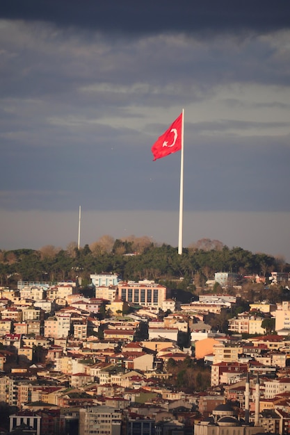 Cityscape of istanbul with turkish flag