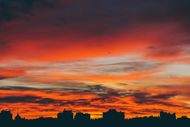 Cityscape with wonderful varicolored vivid dawn.