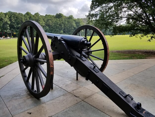 Photo civil war cannon at foot of a hill