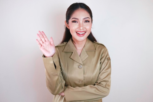 Civil worker greeting with a hand gesture and smiling at camera