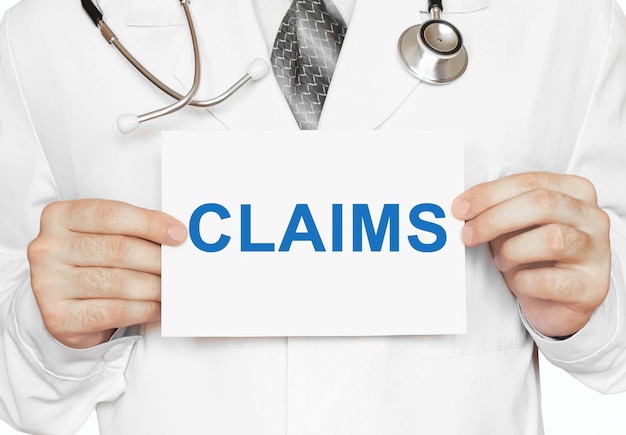 Claims card in hands of Medical Doctor