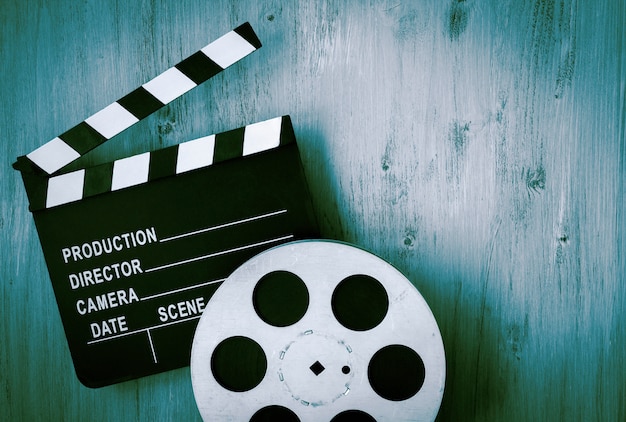 Clapperboards and the reel of film