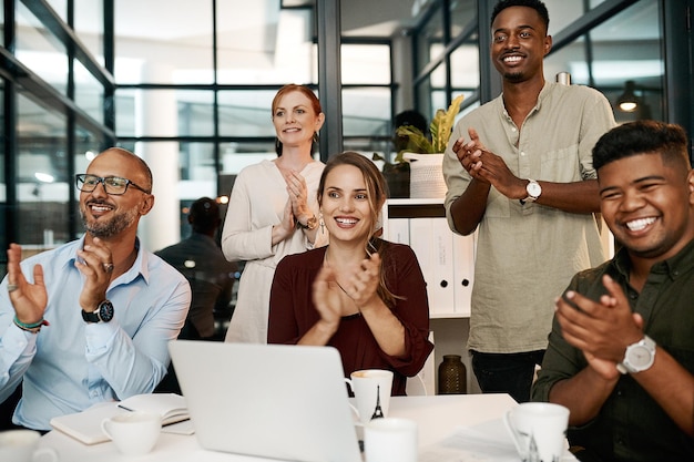 Photo clapping and cheering business people happy at a design conference diverse creative group of designers excited by a goal or idea during a presentation or speech showing support and unity