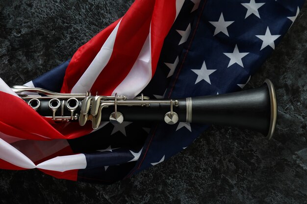 Photo clarinet and american flag on black smokey background