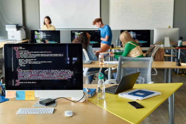 Class with computer on desk in it class