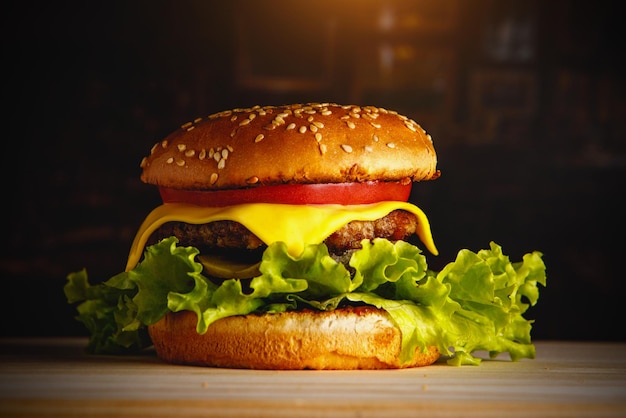 Classic American burger on a wooden desk