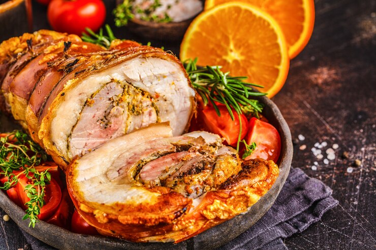 Classic baked pork porchetta with oranges