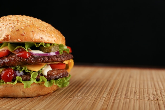 classic burger on dark background  