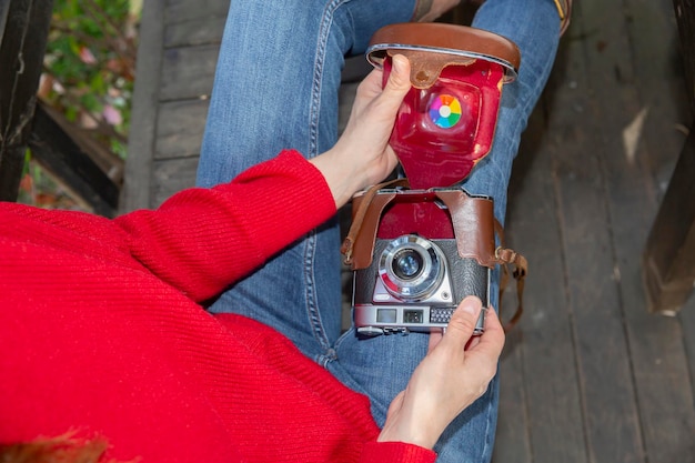 Classic camera in woman hand