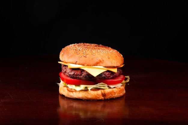 classic cheese burger in dark background