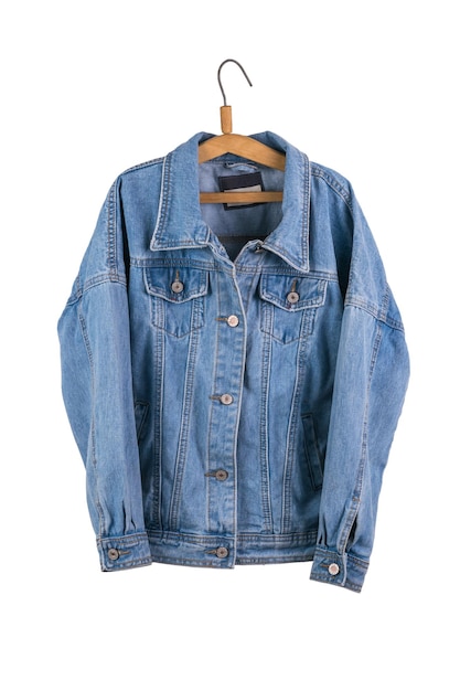 Classic denim jacket on a hanger isolated on a white background