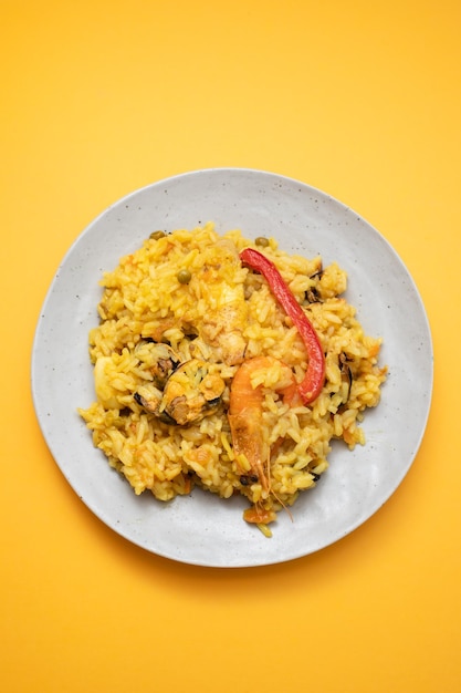 Classic dish of Spain paella in plate