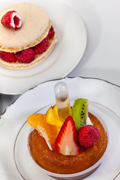 Classic French pastries on white plates