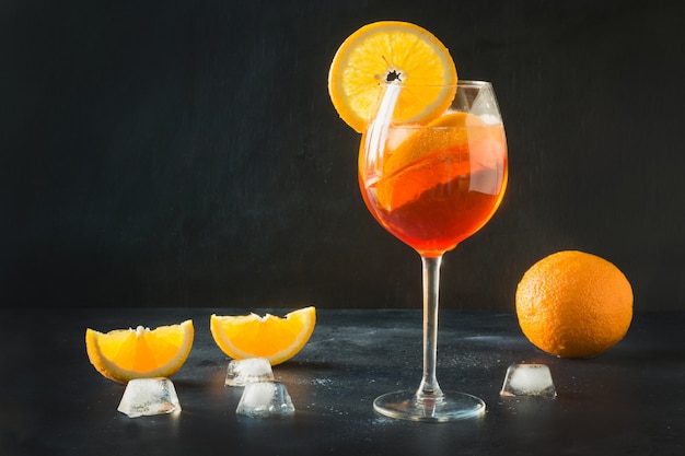 Classic italian aperol spritz cocktail on dark.