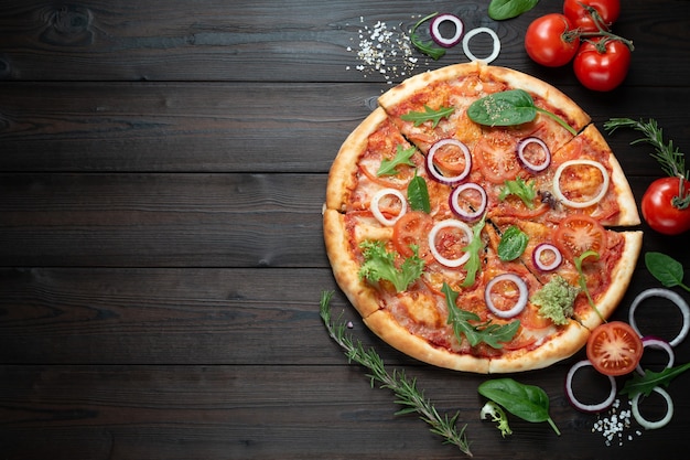 Classic Italian pizza on a dark background