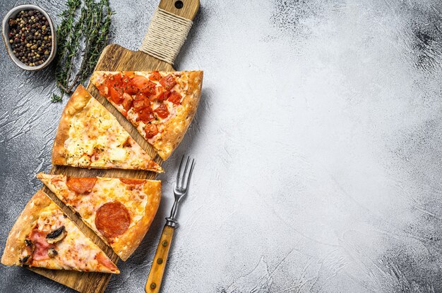 Classic Italian pizza on a wooden cutting board.