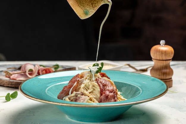 Classic Italian Spaghetti pasta alla carbonara with bacon, parmesan cheese and cream sauce. banner, menu, recipe place for text.