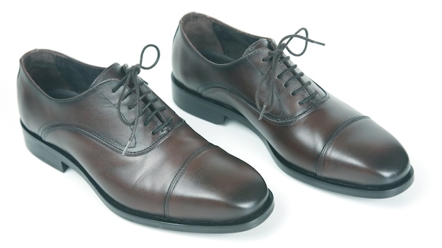 Classic men's brown Oxford shoes on white background. Leather shoes