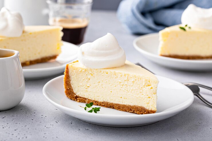 Photo クラシックなニューヨークのチーズケーキとクリームを1杯